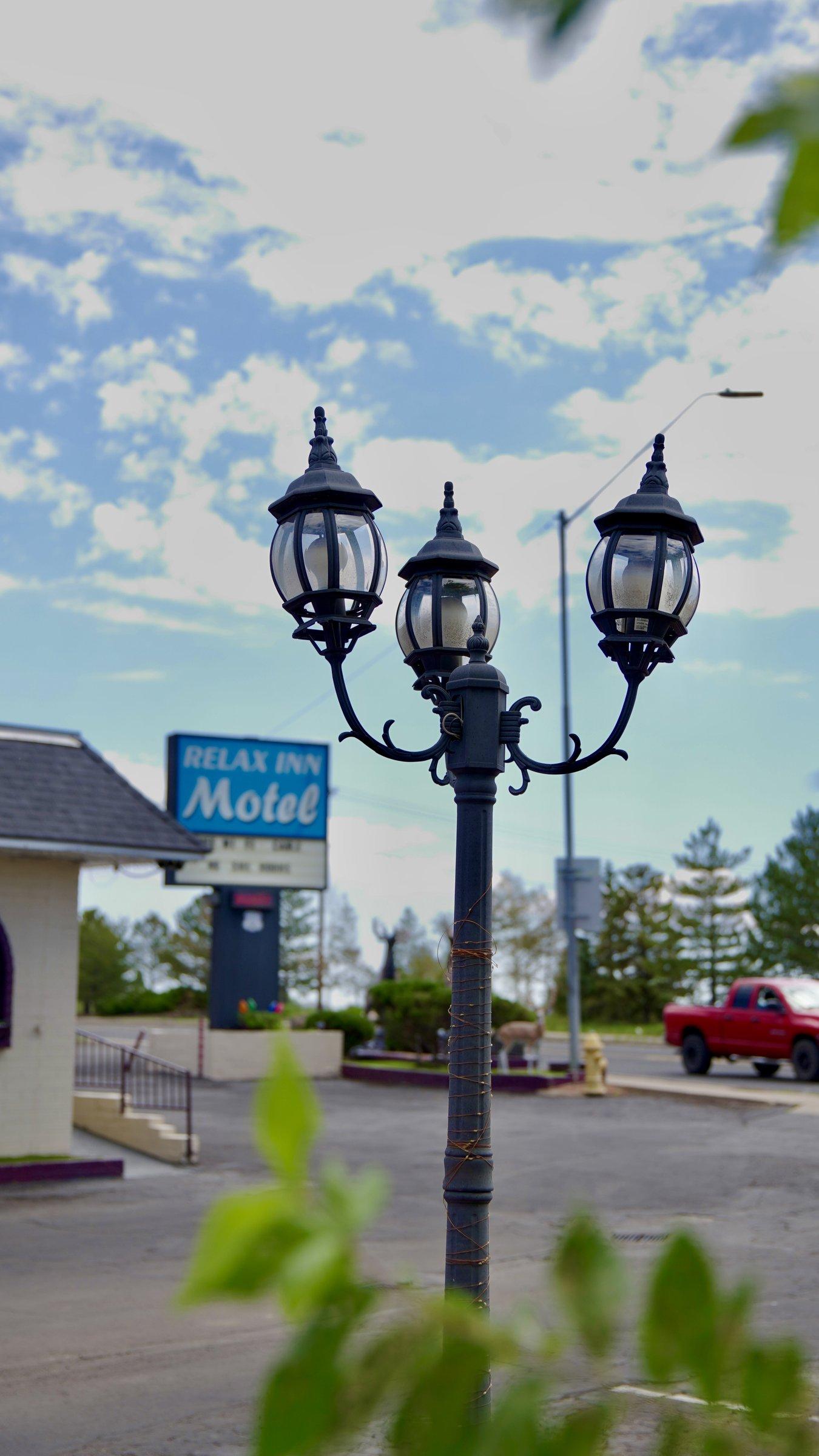 Vintage lamppost with the motel sign in the background