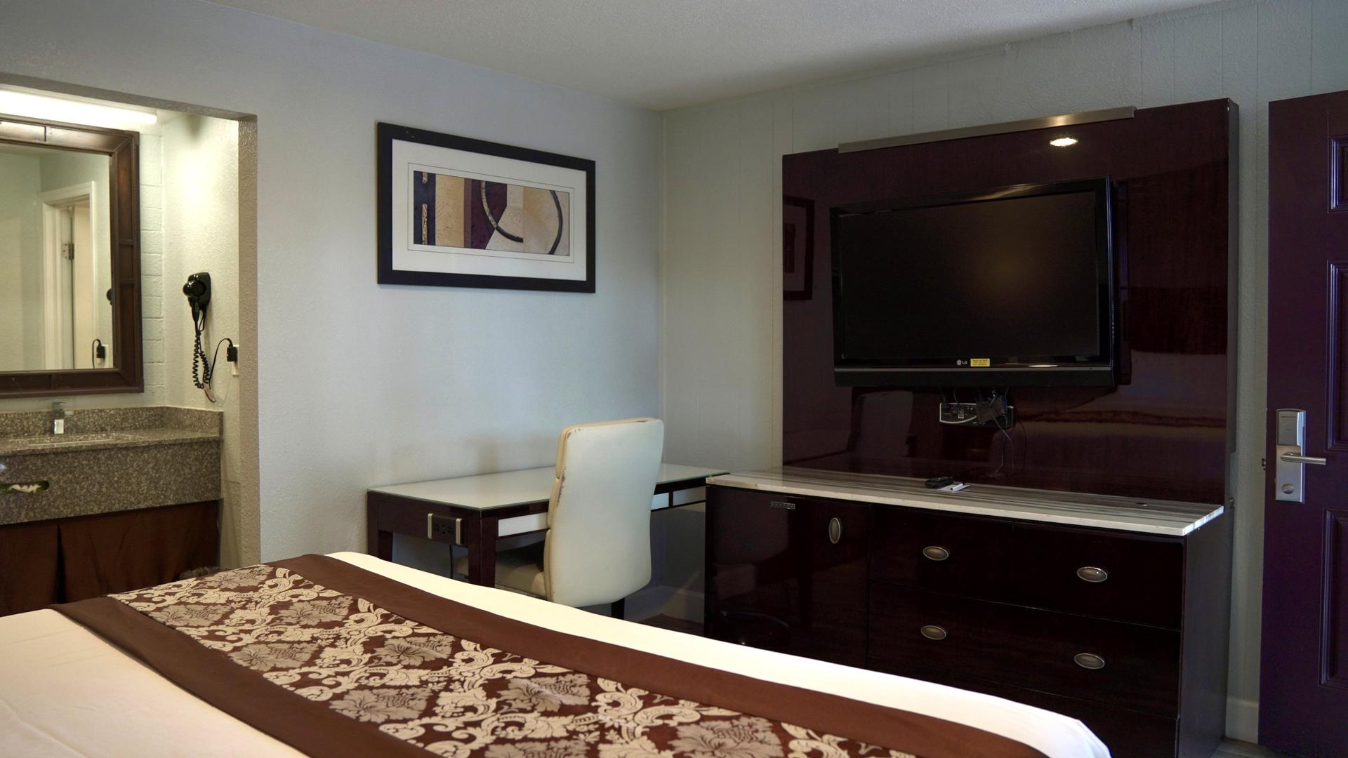 Flat-screen TV and dresser