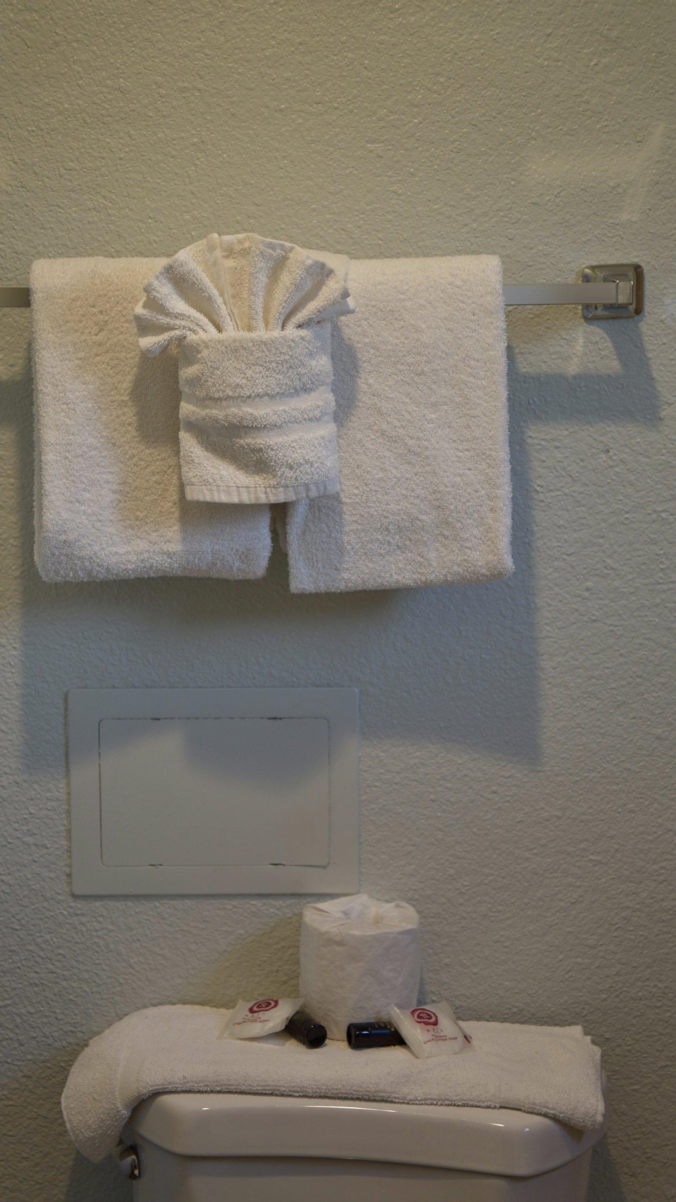 Folded towel art on the rack